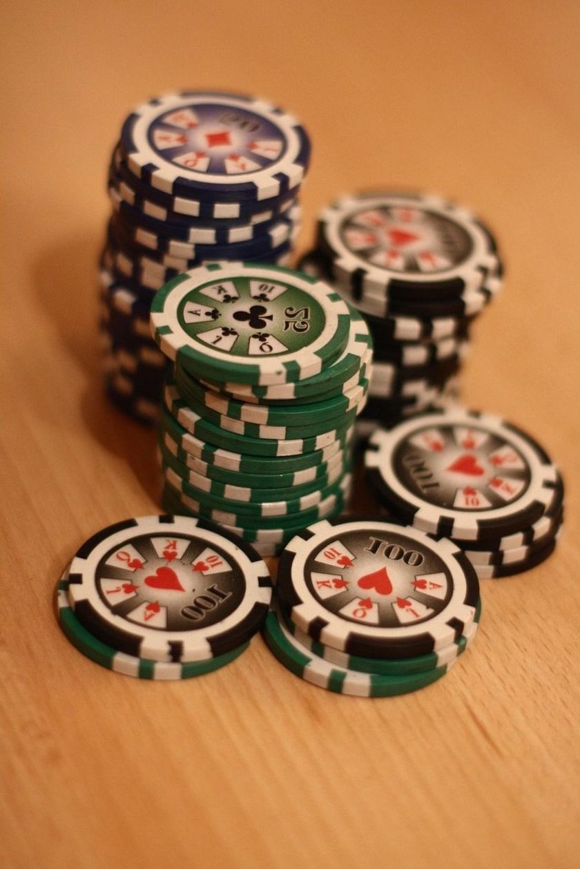 Stacks of green and blue poker chips